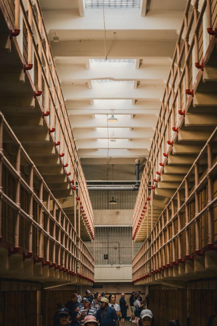 historic prison interior with tourists